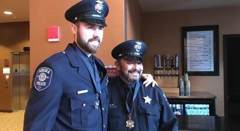 Two Aurora police officers have returned to full duty nearly nine months after being wounded in a mass shooting at the Henry Pratt Company. Two Aurora police officers have returned to full duty nearly nine months after being wounded in a mass shooting at the Henry Pratt Company.
