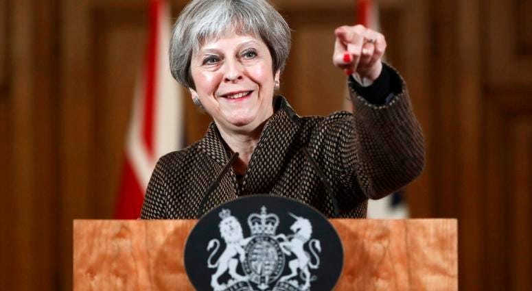Britain's Prime Minister Theresa May gestures during a press conference in 10 Downing Street, London, Saturday, April 14, 2018. British Prime Minister Theresa May says the need to act quickly and protect “operational security” led her to strike Syria with