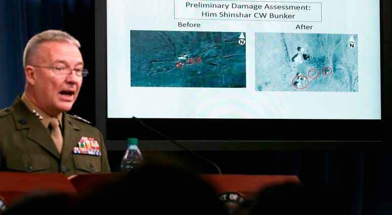Marine Lt. Gen. Kenneth F. McKenzie Marine Lt. Gen. Kenneth F. McKenzie Jr., director, Joint Staff, speaks as he shows photographs from before and after the U.S.-led airstrikes against Syria during a media availability at the Pentagon, Saturday, April 14, 2018, in Washington.