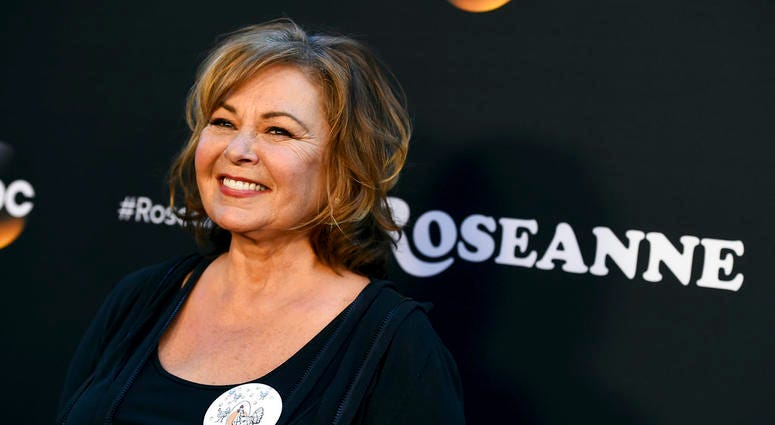 Roseanne Barr arrives at the Los Angeles premiere of "Roseanne" on Friday in Burbank, Calif.