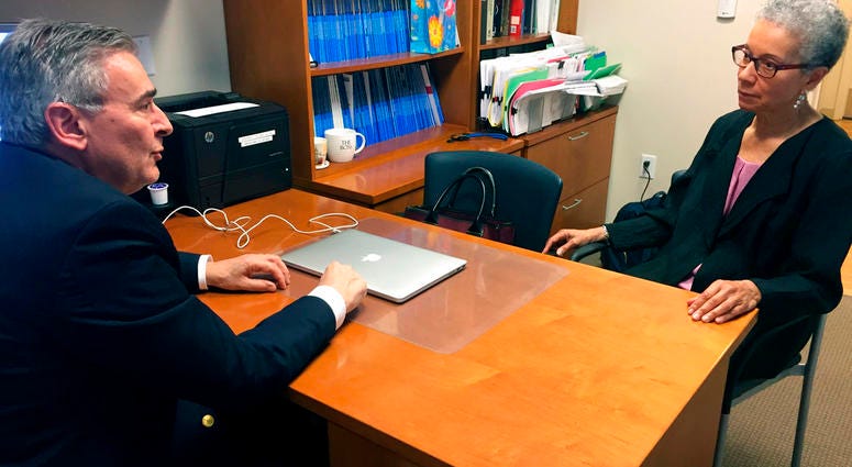 In this Thursday, May 24, 2018 photo, Adine Usher, 78, meets with breast cancer study leader Dr. Joseph Sparano at the Montefiore and Albert Einstein College of Medicine in the Bronx borough of New York. Usher was one of about 10,000 participants in the s
