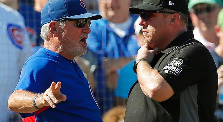 Chicago Cubs manager Joe Maddon, left, speaks to third base umpire Bruce Dreckman about a call on a play during the fourth inning of a baseball game against the Cincinnati Reds, Sunday, Sept. 16, 2018, in Chicago. (AP Photo/Jim Young) Chicago Cubs manager Joe Maddon, left, speaks to third base umpire Bruce Dreckman about a call on a play during the fourth inning of a baseball game against the Cincinnati Reds, Sunday, Sept. 16, 2018, in Chicago. (AP Photo/Jim Young)