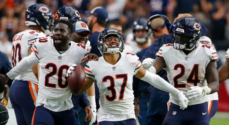Chicago Bears cornerback Bryce Callahan (37) celebrates his interception against the Arizona Cardinals with Prince Amukamara (20) and Jordan Howard (24) during the second half of an NFL football game, Sunday, Sept. 23, 2018, in Glendale, Ariz. (AP Photo/R Chicago Bears cornerback Bryce Callahan (37) celebrates his interception against the Arizona Cardinals with Prince Amukamara (20) and Jordan Howard (24) during the second half of an NFL football game, Sunday, Sept. 23, 2018, in Glendale, Ariz. (AP Photo/R