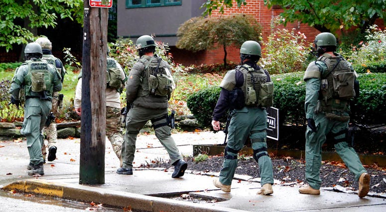 Polikce respond to an active shooter situation at the Tree of Life synagogue on Wildins Avenue in the Squirrel Hill neighborhood of Pittsburgh, Pa., on Saturday, October 27, 2018. (Pam Panchak/Pittsburgh Post-Gazette via AP) Polikce respond to an active shooter situation at the Tree of Life synagogue on Wildins Avenue in the Squirrel Hill neighborhood of Pittsburgh, Pa., on Saturday, October 27, 2018. (Pam Panchak/Pittsburgh Post-Gazette via AP)