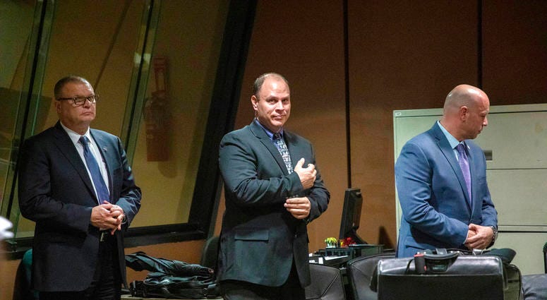 FILE - In this Oct. 30, 2018 file photo, from left, former Detective David March, Chicago Police Officer Thomas Gaffney and former officer Joseph Walsh appear at a pre-trial hearing at Leighton Criminal Court Building in Chicago. Prosecutors have laid out FILE - In this Oct. 30, 2018 file photo, from left, former Detective David March, Chicago Police Officer Thomas Gaffney and former officer Joseph Walsh appear at a pre-trial hearing at Leighton Criminal Court Building in Chicago. Prosecutors have laid out
