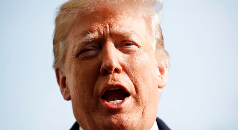 President Donald Trump talks to media before boarding Marine One on the South Lawn of the White House in Washington, Saturday, Dec. 8, 2018, for the short trip to Andrews Air Force Base en route to Philadelphia to attend the Army-Navy Football Game. (AP P President Donald Trump talks to media before boarding Marine One on the South Lawn of the White House in Washington, Saturday, Dec. 8, 2018, for the short trip to Andrews Air Force Base en route to Philadelphia to attend the Army-Navy Football Game. (AP P