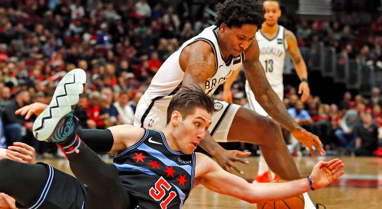 Brooklyn Nets forward Ed Davis, and Chicago Bulls guard Ryan Arcidiacono (51), go for a loose ball during the second half of an NBA basketball game Sunday, Jan. 6, 2019, in Chicago. (AP Photo/Nuccio DiNuzzo) Brooklyn Nets forward Ed Davis, and Chicago Bulls guard Ryan Arcidiacono (51), go for a loose ball during the second half of an NBA basketball game Sunday, Jan. 6, 2019, in Chicago. (AP Photo/Nuccio DiNuzzo)