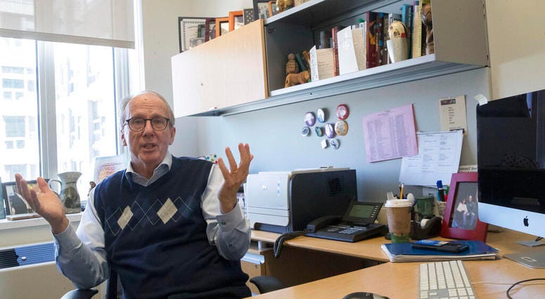 In this Tuesday, April 16, 2019, photo Steve Burghardt, a professor of social work at the City University of New York, gestures as he speaks in his office at Hunter College's Silberman School of Social Work. In this Tuesday, April 16, 2019, photo Steve Burghardt, a professor of social work at the City University of New York, gestures as he speaks in his office at Hunter College's Silberman School of Social Work.
