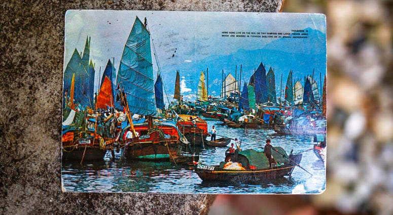 Kim Draper received a postcard, which depicts a scene of fishing boats in Hong Kong, at her home in Springfield on July 8, 2019 that was postmarked and sent from Hong Kong exactly 26 years ago on July 8, 1993 Kim Draper received a postcard, which depicts a scene of fishing boats in Hong Kong, at her home in Springfield on July 8, 2019 that was postmarked and sent from Hong Kong exactly 26 years ago on July 8, 1993