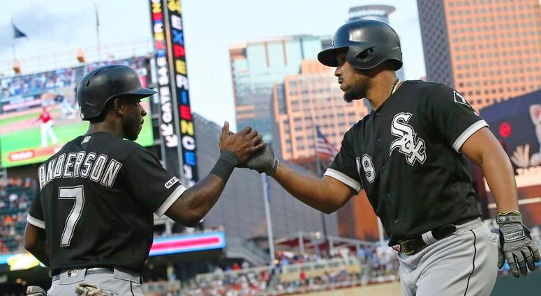 Chicago White Sox's Tim Anderson, left, congratulates Jose Abreu on Abreu's two-run home run off Minnesota Twins pitcher Michael Pineda in the third inning of a baseball game Tuesday, Aug. 20, 2019, in Minneapolis Chicago White Sox's Tim Anderson, left, congratulates Jose Abreu on Abreu's two-run home run off Minnesota Twins pitcher Michael Pineda in the third inning of a baseball game Tuesday, Aug. 20, 2019, in Minneapolis