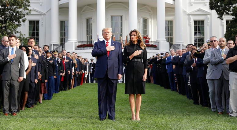 President Donald Trump and first lady Melania Trump participate in a moment of silence honoring the victims of the Sept. 11 terrorist attacks, on the South Lawn of the White House, Wednesday, Sept. 11, 2019, in Washington. President Donald Trump and first lady Melania Trump participate in a moment of silence honoring the victims of the Sept. 11 terrorist attacks, on the South Lawn of the White House, Wednesday, Sept. 11, 2019, in Washington.