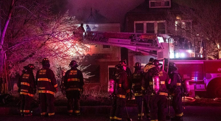 Chicago Fire Fighters battle a 3-11 alarm fire Monday night, in the 4200 block of South Ashland, in the Back of the Yards neighborhood.