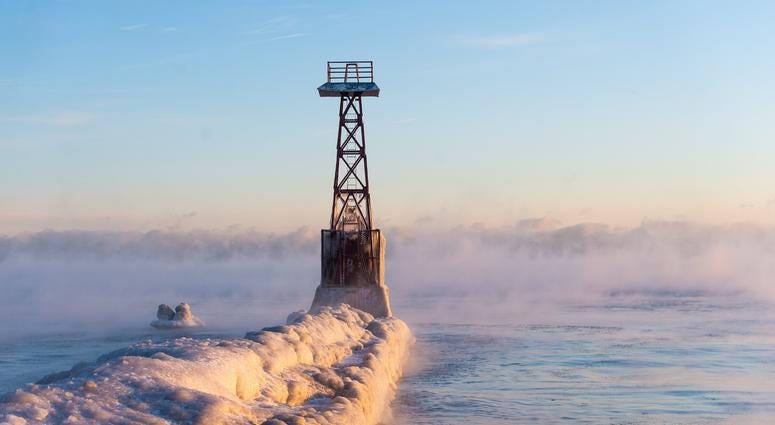 Chicago’s lakefront is frozen over Friday morning as temperatures drop below zero, Friday, Jan. 25, 2019, in Chicago.