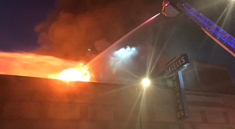 Firefighters are tackling a three-alarm fire at a commercial building in Roseland. Firefighters are tackling a three-alarm fire at a commercial building in Roseland.