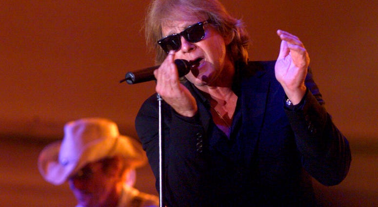 In this Aug. 6, 2004 file photo, Eddie Money performs during Grandstand Under the Stars at the Diamond Jo Casino in Dubuque, Iowa. In this Aug. 6, 2004 file photo, Eddie Money performs during Grandstand Under the Stars at the Diamond Jo Casino in Dubuque, Iowa.