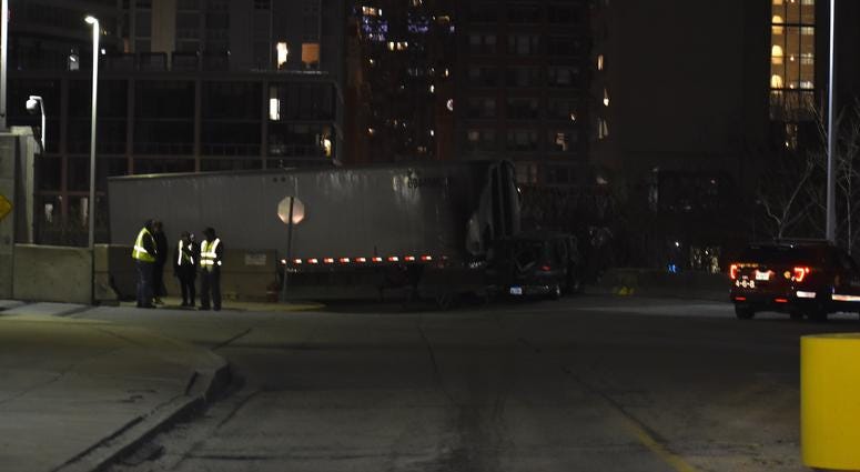 Authorities investigate the scene of a fatal crash on Dec. 15, 2019 in the 400 block of West Polk Street in the South Loop. Carly Behm/Sun-Times