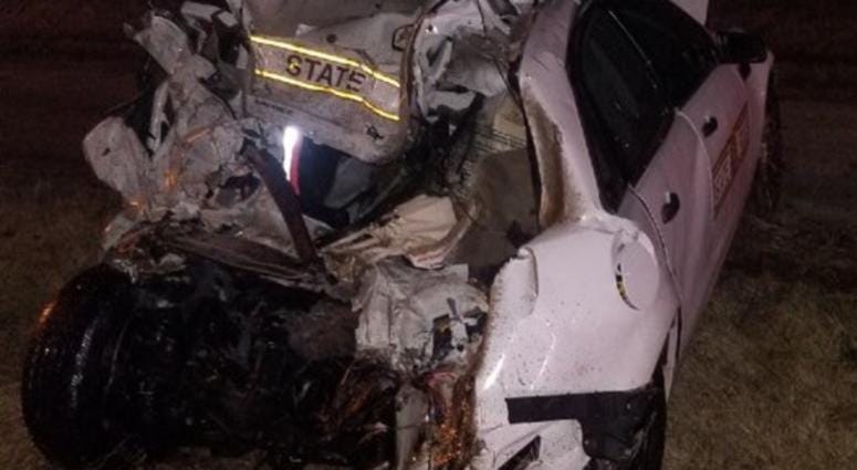An Illinois State Police trooper was seriously injured when he and his squad car were hit by a semi Wednesday night in downstate Collinsville. An Illinois State Police trooper was seriously injured when he and his squad car were hit by a semi Wednesday night in downstate Collinsville.