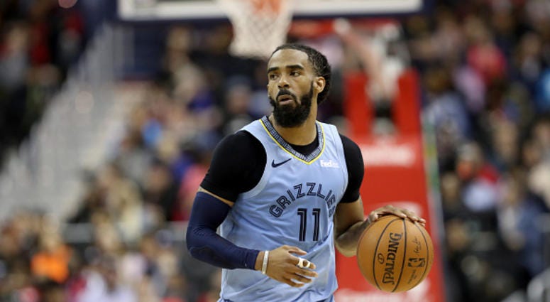 Mike Conley Mike Conley of the Memphis Grizzlies dribbles the ball in a game against the Wizards.