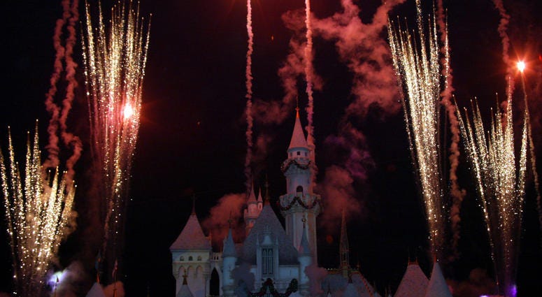 A fireworks display is seen during the holiday lighting ceremony at Disneyland on November 25, 2003 in Anaheim, California. A fireworks display is seen during the holiday lighting ceremony at Disneyland on November 25, 2003 in Anaheim, California.