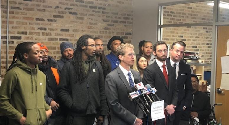 Attorney Jon Loevy stood with most of the 19 plaintiffs, all alleging they were targets of corrupt ex-sergeant Ronald Watts and his crew.