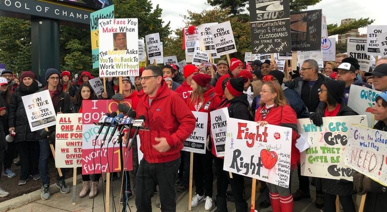 Chicago Teachers Union President Jesse Sharkey joined teachers and support staff Friday on the picket line at Lane Tech College Prep High School. Chicago Teachers Union President Jesse Sharkey joined teachers and support staff Friday on the picket line at Lane Tech College Prep High School.