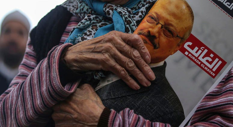 A woman holds a poster during the funeral prayers in absentia for Saudi writer Jamal Khashoggi who was killed last month in the Saudi Arabia consulate, in Istanbul, Friday, Nov. 16, 2018 A woman holds a poster during the funeral prayers in absentia for Saudi writer Jamal Khashoggi who was killed last month in the Saudi Arabia consulate, in Istanbul, Friday, Nov. 16, 2018