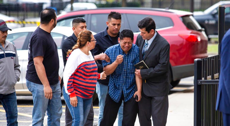 Arnulfo Ochoa, the father of Marlen Ochoa-Lopez, is surrounded by family members and supporters, as he walks into the Cook County medical examiner's office to identify his daughter's body, Thursday, May 16, 2019 in Chicago Arnulfo Ochoa, the father of Marlen Ochoa-Lopez, is surrounded by family members and supporters, as he walks into the Cook County medical examiner's office to identify his daughter's body, Thursday, May 16, 2019 in Chicago