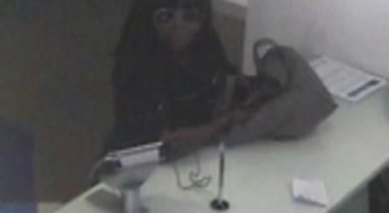 Surveillance image of the woman suspected of robbing a Citibank branch on June 15, 2019, at 2295 N. Milwaukee Ave. Surveillance image of the woman suspected of robbing a Citibank branch on June 15, 2019, at 2295 N. Milwaukee Ave.