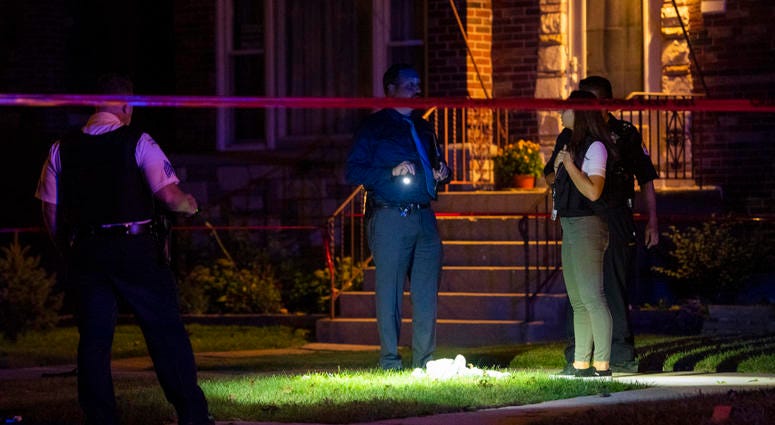 Police investigate the scene where a 16-year-old was shot and killed in 3000 block of North Rutherford on Oct. 8.