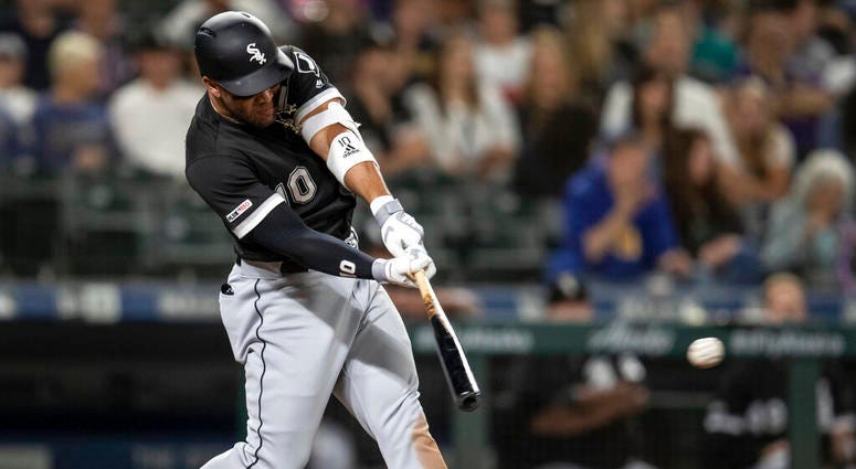 Chicago White Sox's Yoan Moncada hits an RBI triple off of Seattle Mariners starting pitcher Yusei Kikuchi during the third inning of a baseball game Friday, Sept. 13, 2019, in Seattle. Chicago White Sox's Yoan Moncada hits an RBI triple off of Seattle Mariners starting pitcher Yusei Kikuchi during the third inning of a baseball game Friday, Sept. 13, 2019, in Seattle.