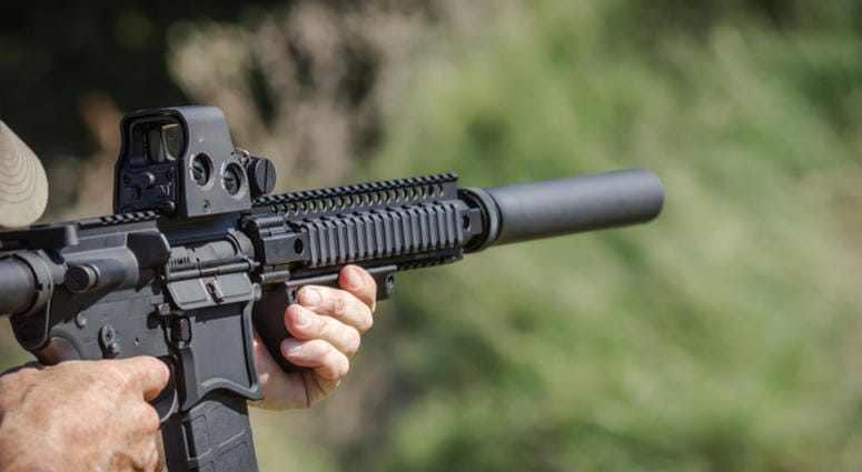 Gun with bump stock Gun with bump stock