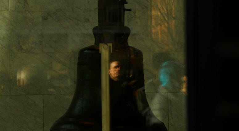A tourist is reflected in a window of the closed building housing the Liberty Bell, Wednesday, Dec. 26, 2018, in Philadelphia. A tourist is reflected in a window of the closed building housing the Liberty Bell, Wednesday, Dec. 26, 2018, in Philadelphia.