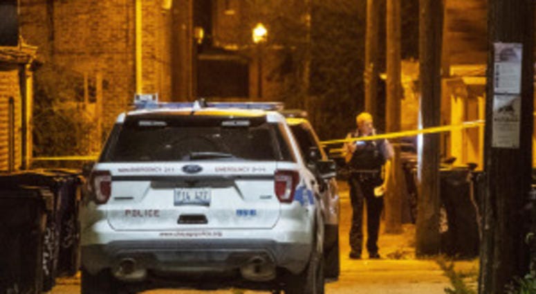 Police investigate an alley where a man was shot in the back Friday morning in the 3500 block of South Hoyne. A second scene thought to be related to this shooting was found a few block away in the 3200 block of South Hamilton. Police investigate an alley where a man was shot in the back Friday morning in the 3500 block of South Hoyne. A second scene thought to be related to this shooting was found a few block away in the 3200 block of South Hamilton.