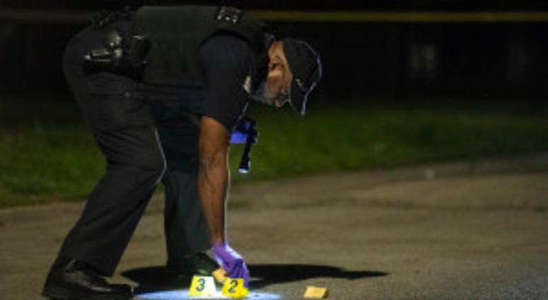 Chicago police investigate the scene where a woman who was shot Thursday night in the 8400 block of South Green. | Tyler LaRiviere/Sun-Times Chicago police investigate the scene where a woman who was shot Thursday night in the 8400 block of South Green. | Tyler LaRiviere/Sun-Times