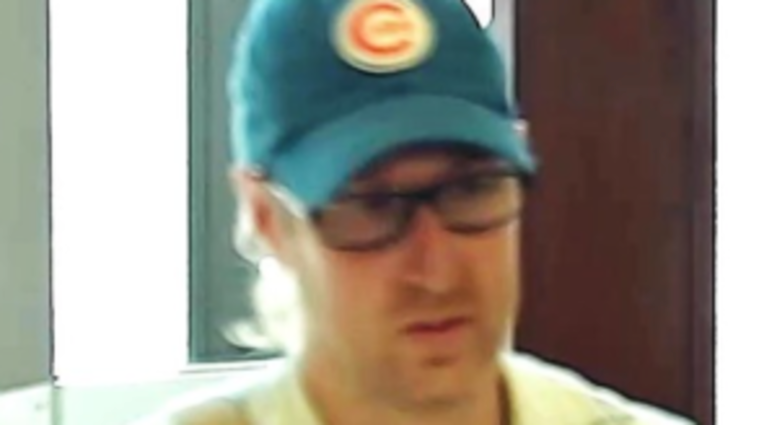 A surveillance photo of a man who robbed three northwest suburban bank branches in less than a month. | FBI A surveillance photo of a man who robbed three northwest suburban bank branches in less than a month. | FBI