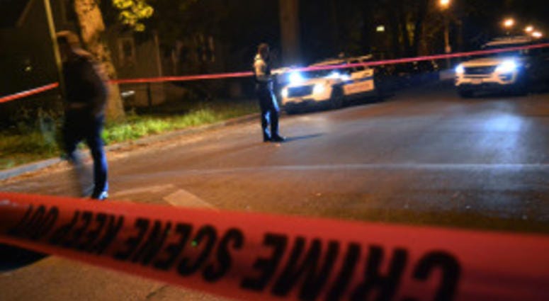 Police investigate a shooting about 11 p.m. Wednesday, June 6, 2018 in the 800 block of West 53rd St. in Chicago.