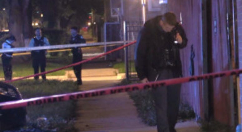 Police investigate a shooting about 2:30 a.m. Sunday, October 14, 2018 in the 1100 block of North Long Avenue in Chicago. | Justin Jackson/ Sun-Times Police investigate a shooting about 2:30 a.m. Sunday, October 14, 2018 in the 1100 block of North Long Avenue in Chicago. | Justin Jackson/ Sun-Times