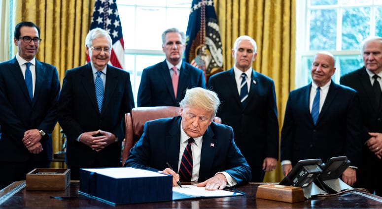 Trump Signs COVID 19 Aid Bill