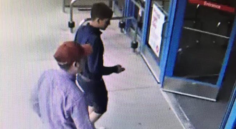 Surveillance photo of person wanted for using a stolen credit card in Downers Grove, suspected of stealing purse in Lemont