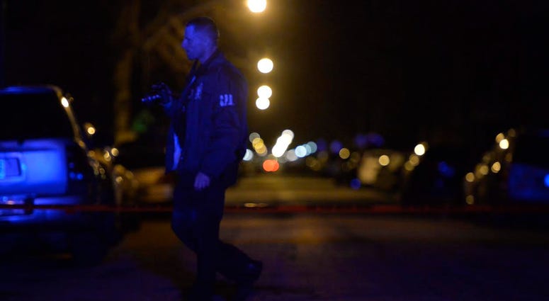 Police investigate the scene of a shooting about 9 p.m. on April 9 in the 3500 block of South Honore