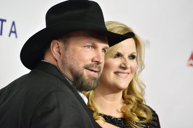 Garth Brooks and Trisha Yearwood at the 2019 MusiCares Person Of The Year Honoring Dolly Parton held at the Los Angeles Convention Center in Los Angeles, CA Garth Brooks and Trisha Yearwood at the 2019 MusiCares Person Of The Year Honoring Dolly Parton held at the Los Angeles Convention Center in Los Angeles, CA
