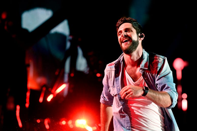 Thomas Rhett performs during the 2018 CMA Music Festival Thomas Rhett performs during the 2018 CMA Music Festival