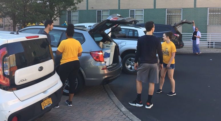 Students and parents at Canisius College moving in. August 23, 2018 (WBEN Photo/Mike Baggerman)