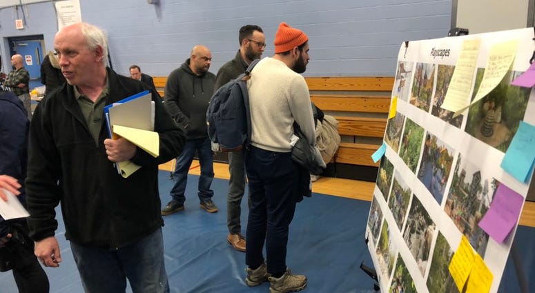The public gathers at the Belle Center in Buffalo for a community meeting on LaSalle Park revitalization.