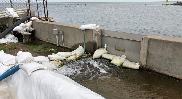 Flooding in patio area of Olcott Yacht Club by Lake Ontario. July 11, 2019 (WBEN Photo/Mike Baggerman)