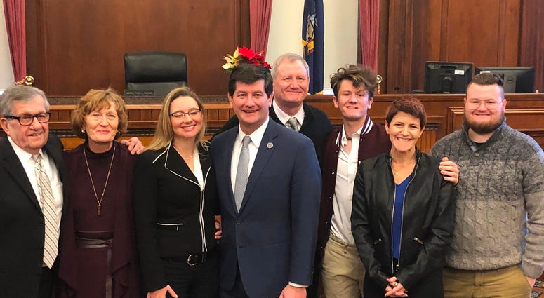 Erie County Executive Mark Poloncarz poses with family members and Justice Gerald J. Whalen after his inauguration as Erie County Executive. December 31, 2019 (WBEN Photo/Mike Baggerman) Erie County Executive Mark Poloncarz poses with family members and Justice Gerald J. Whalen after his inauguration as Erie County Executive. December 31, 2019 (WBEN Photo/Mike Baggerman)