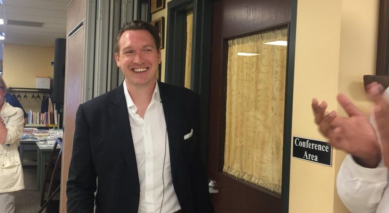 Nathan McMurray moments before speaking publicly following indictment of Rep. Chris Collins. August 8, 2018 (WBEN Photo/Mike Baggerman)