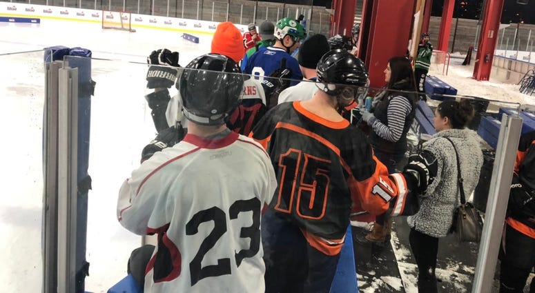 Players getting ready to participate in the skills competition of the Labatt Blue Pond Hockey Tournament