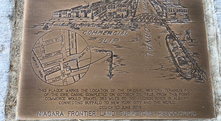 The plaque at Canalside at the corner of Explore & More Children's Museum and the Replica Canals. June 12, 2019 (WBEN Photo/Mike Baggerman)