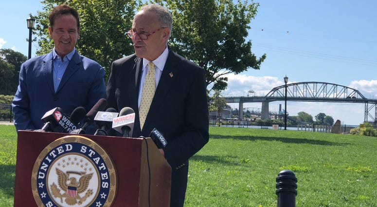 Brian Higgins and Chuck Schumer announce the BOUND Act legislation with the Peace Bridge in the background. September 5, 2019 WBEN Photo/Mike Baggerman